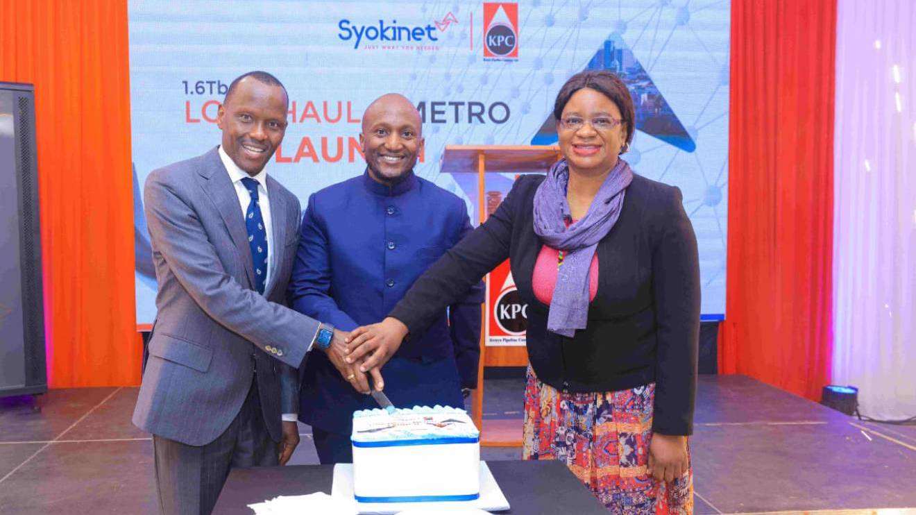 KPC MD, Joe Sang (left), Syokinet Solutions CEO, Ian Kasyoki (center) and Technology Service Providers of Kenya (TESPOK) CEO Fiona Asonga celebrate the onboarding of Syokinet Solutions to KPC's FOC network. PHOTO/COURTESY